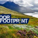 Scottish highland loch landscape with 'oor footprint' graphic in foreground